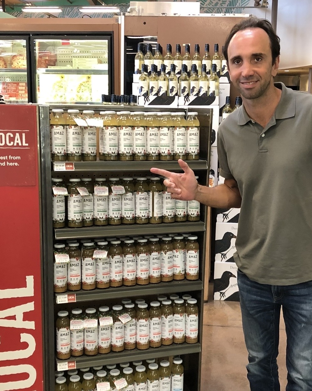 Gustavo Nader at the AMAZ Whole Foods Market ‘We Love Local’ display