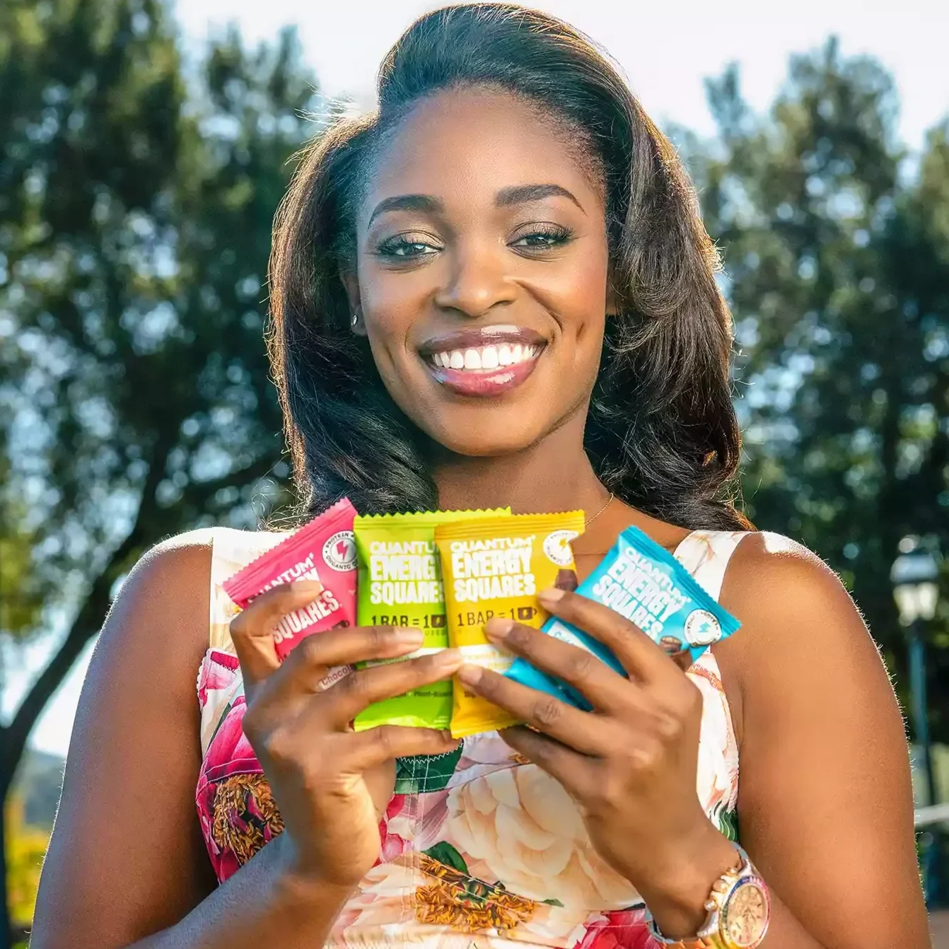 Sloane Stephens holding Quantum Energy Squares bars